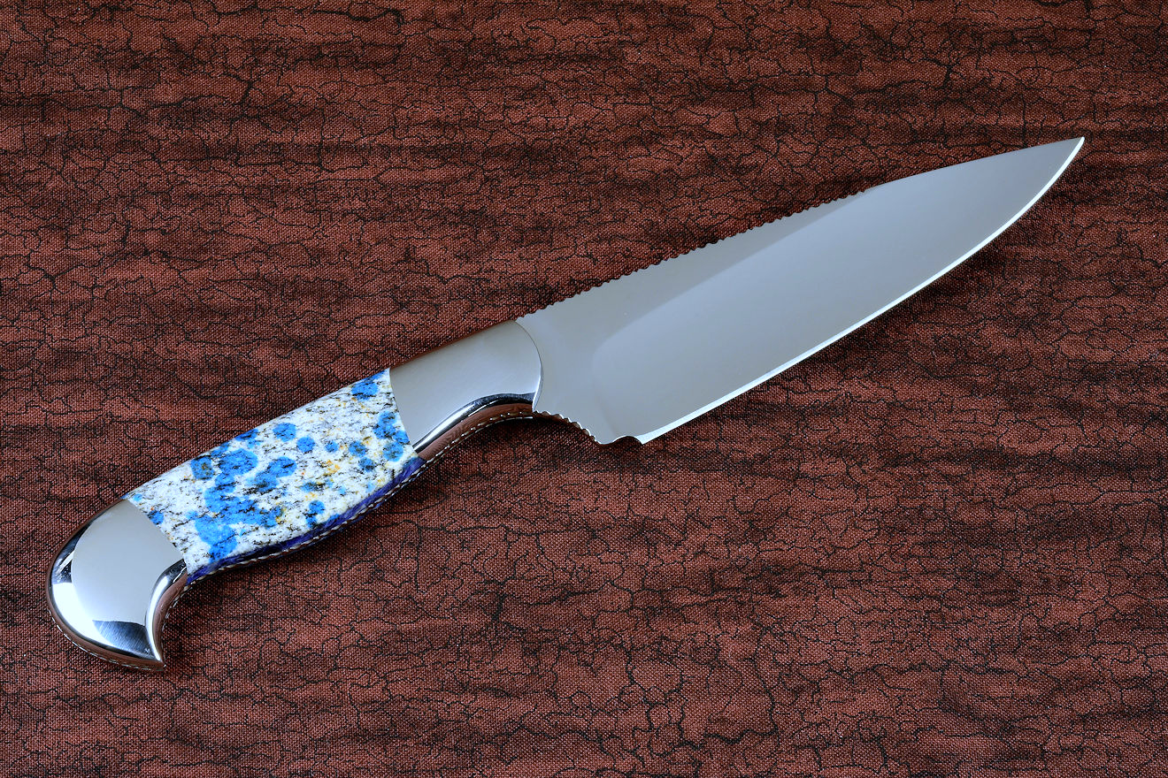 "Andromeda" reverse side view in T3 deep cryogenically treated CPM 154CM powder metal technology high molybdenum stainless steel blade, 304 stainless steel bolsters, K2 Azurite Granite gemstone handle, hand-carved leather sheath inlaid with blue rayskin