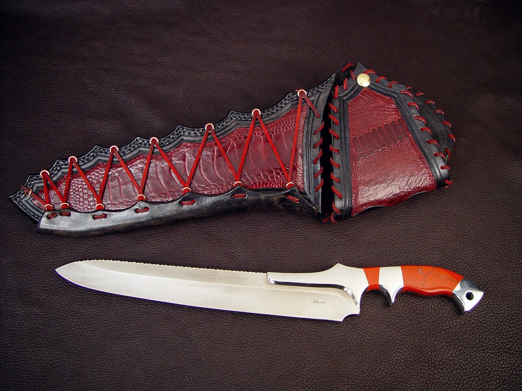 "Artemis" obverse side view: CPMS30V high vanadium stainless tool steel blade, 304 stainless steel bolsters, Red River Jasper gemstone handle, ostrich leg skin inlaid in hand-carved leather sheath