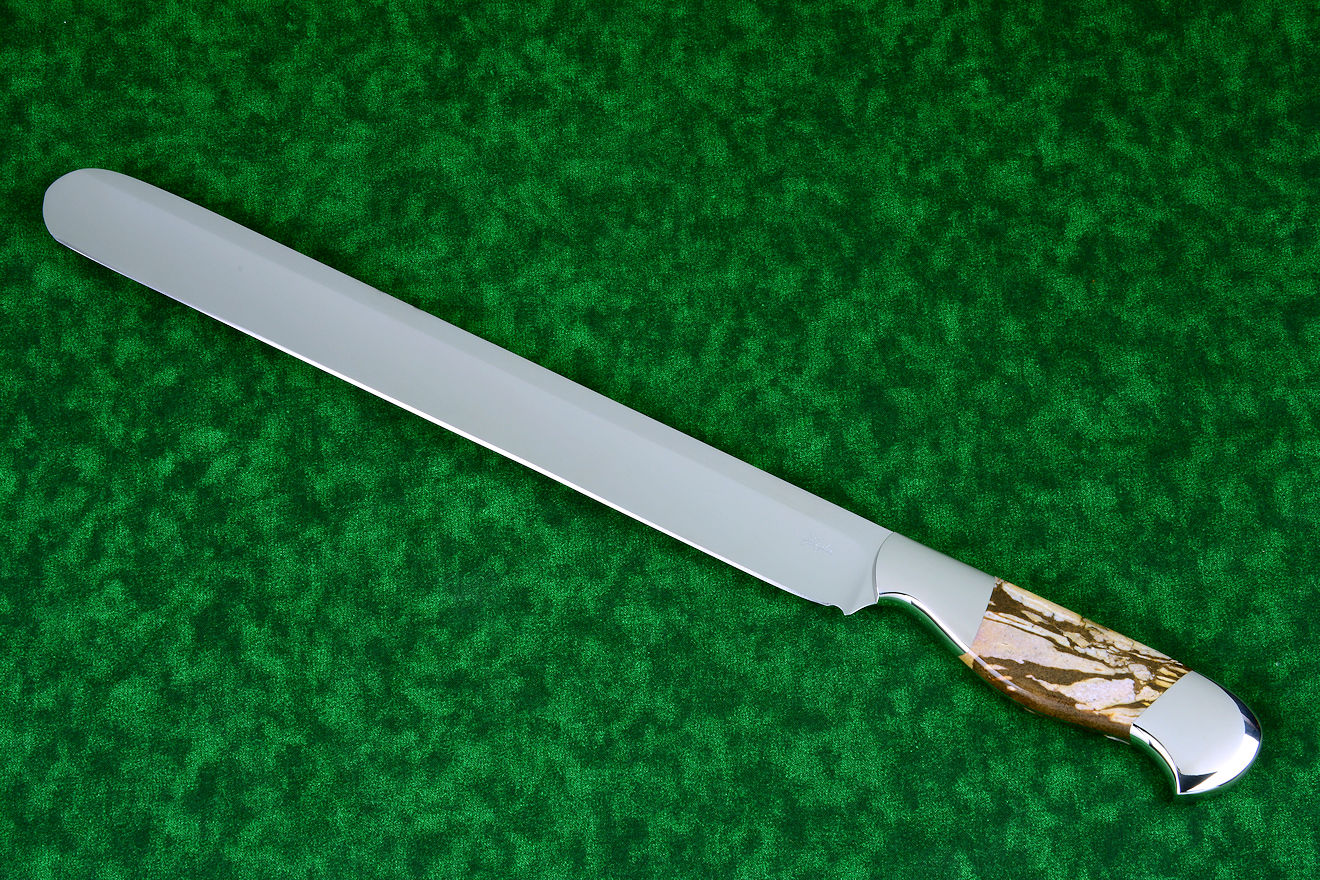 "Rebanador" fine professional grade knife, obverse side view in 440C high chromium stainless steel blade treated with T3 cryogenic heat treatment, 304 stainless steel bolsters, Brown Zebra Jasper gemstone handle