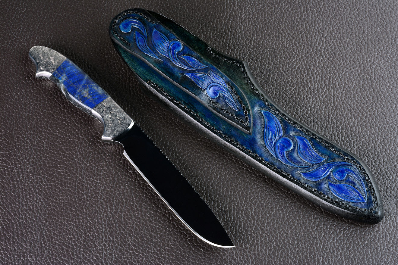"Carina" reverse side view in mirror polished and hot-blued O1 high carbon tungsten-vanadium tool steel blade, hand-engraved 304 stainless steel bolsters, Labradorite gemstone handle, hand-carved, hand-dyed leather sheath