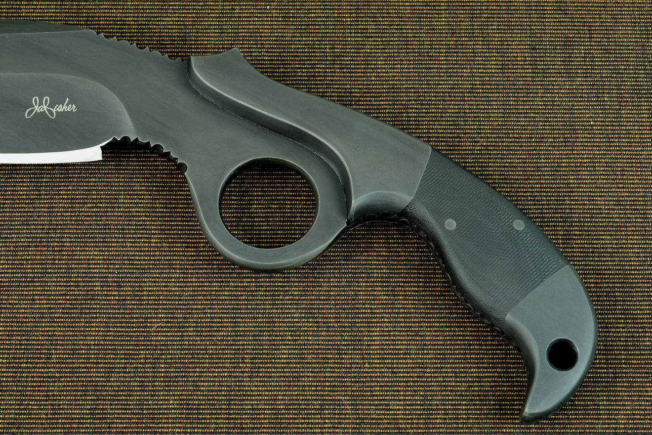 "Chronos" handle detail. The finger ring is contoured and smoothed, the bolsters support a wide area of the angled "gun" shaped handle, giving a more natural wrist position