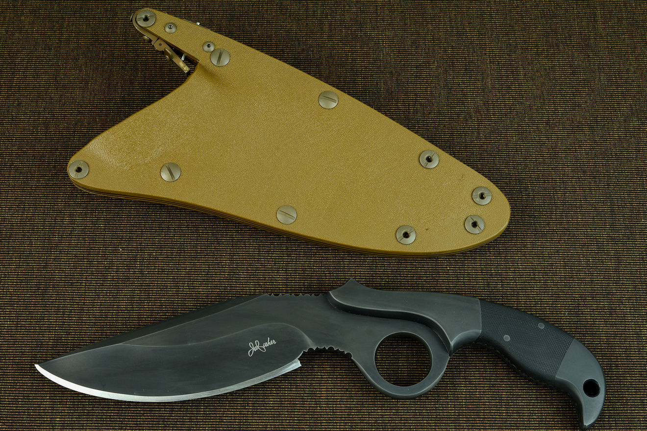 "Chronos" obverse side view, shown with Coyote tan locking sheath. Dark tone of blade and bolsters creates subdued finish, minimized reflection