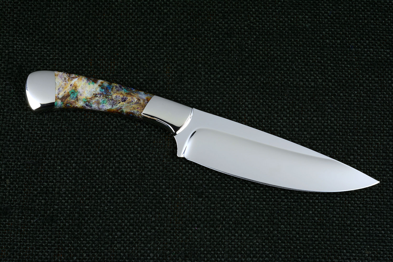 Cygnus ST, reverse side blade view,  in CPM154CM powder metal technology high molybenum stainless steel, T3 Deep cryogenically treated blade, 304 stainless steel bolsters, Kaleidoscope Stone gemstone handle, hand-dyed, hand-cast silicone prise
