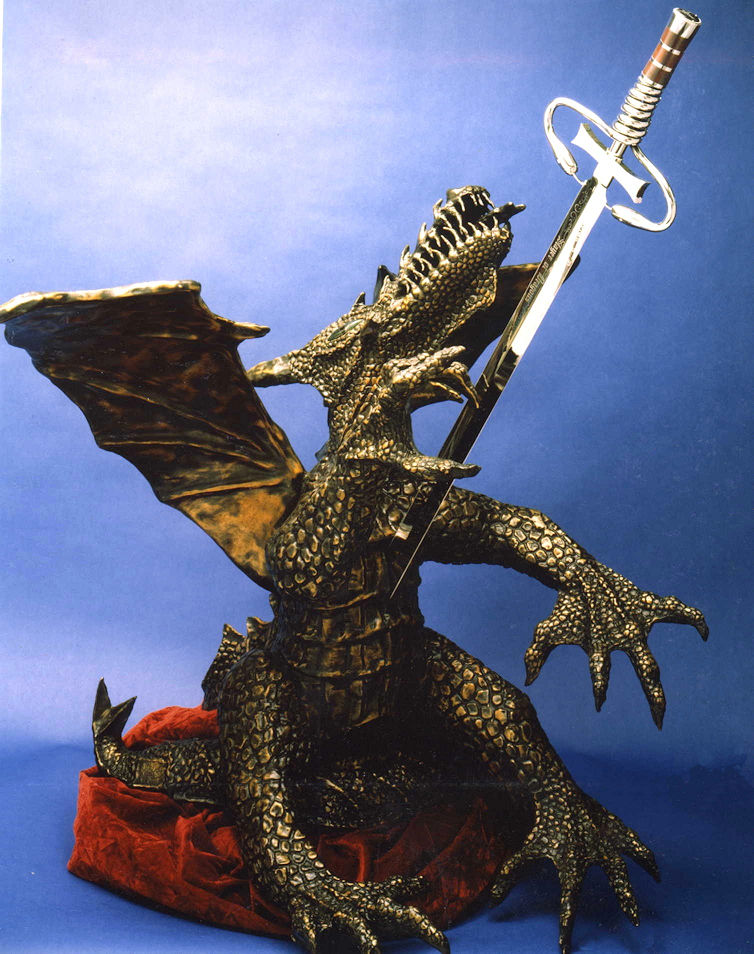 Dragonslayer-the Taste of Steel: 400 pounds of bronze and a 56" sword, representing the slaying of the black dragon of cancer