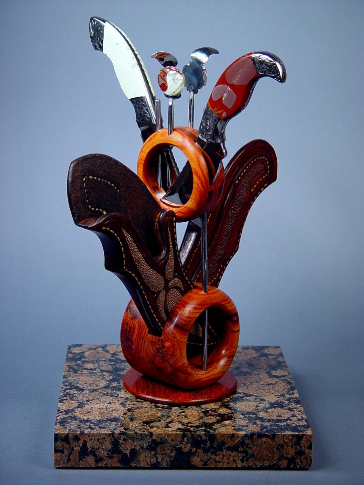 Custom Knife display stand for Izanami, Izanagi knives and sheaths. Stand is granite, tulipwood, 304 stainless steel, Noreena Jasper and Nickel Magnesite gemstone, and Paduk hardwood