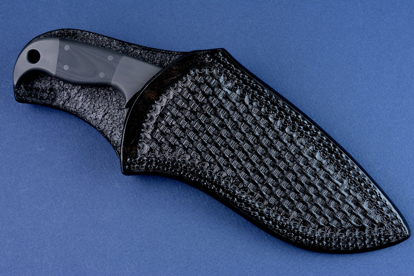"Kairos" (Shadow Line) sheathed view. Sheath is fully double row stitched in thick heavy leather shoulder, hand-stamped with black basketweave 