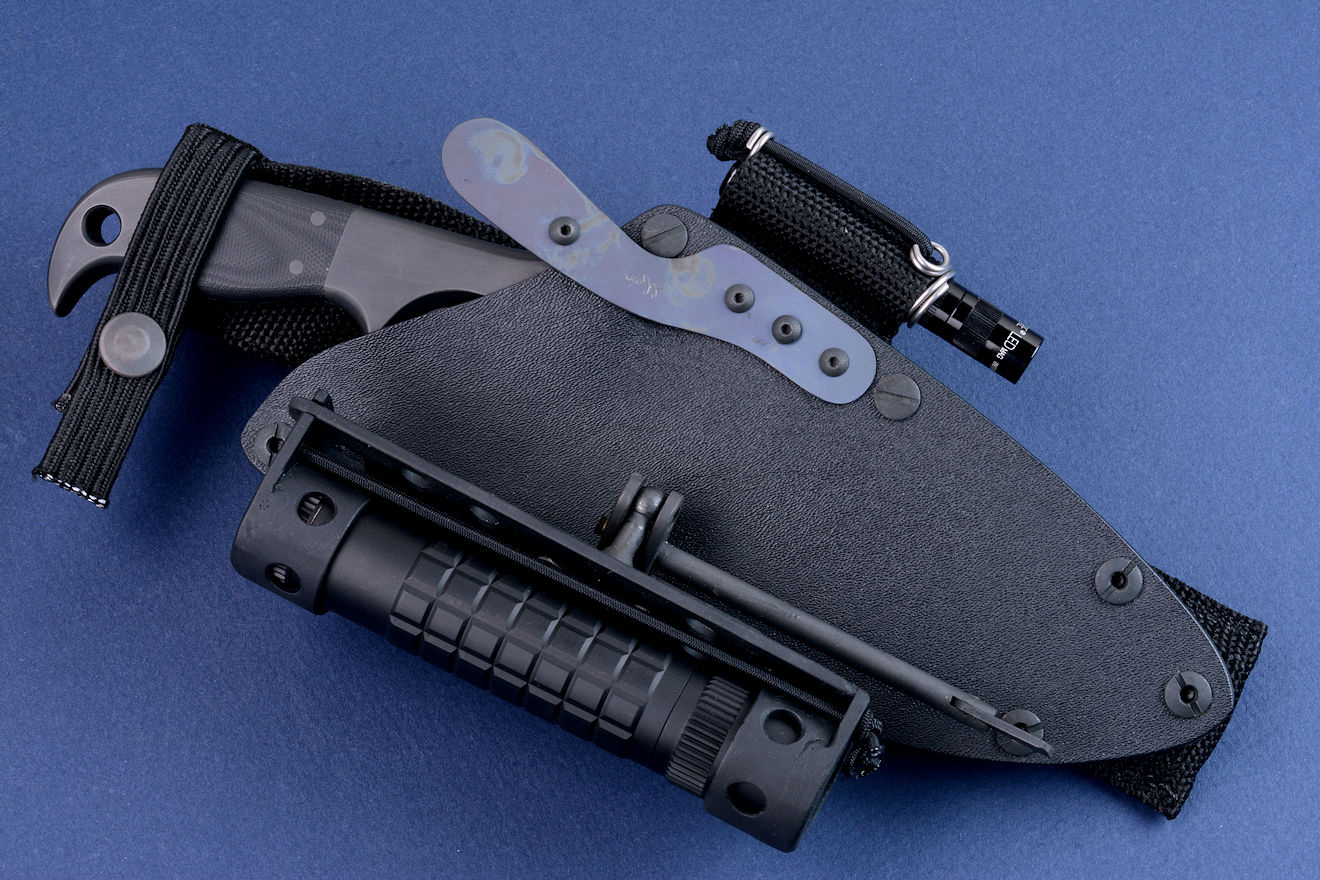 "Kairos" combat, counterterrorism knife in 440C high chromium stainless steel blade, 304 stainless steel bolsters, G10 fiberglass/epoxy composite handle, hybrid tension-locking sheath in kydex, anodized aluminum, stainless steel with HULA, LIMA, and UBLX