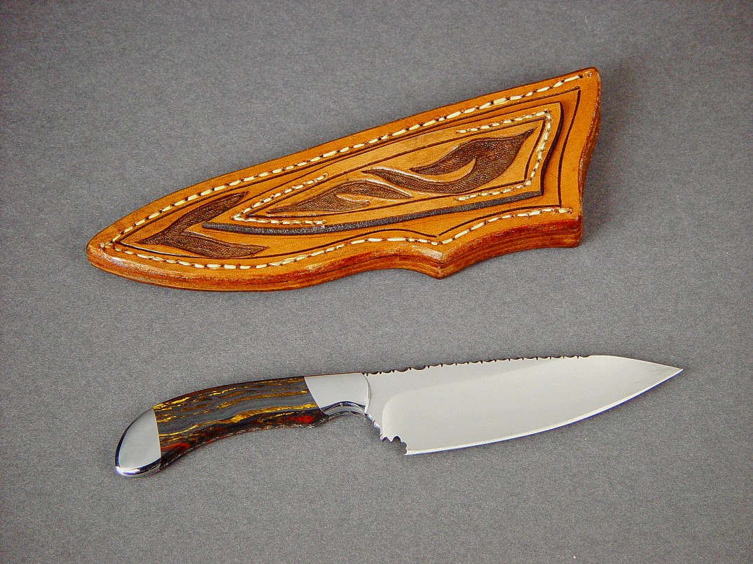 "La Cocina" chef's knife, obverse side view in ATS-34 high molybdenum stainless steel blade, 304 stainless steel bolsters, Australian Tiger Iron Gemstone handle, hand-carved leather sheath