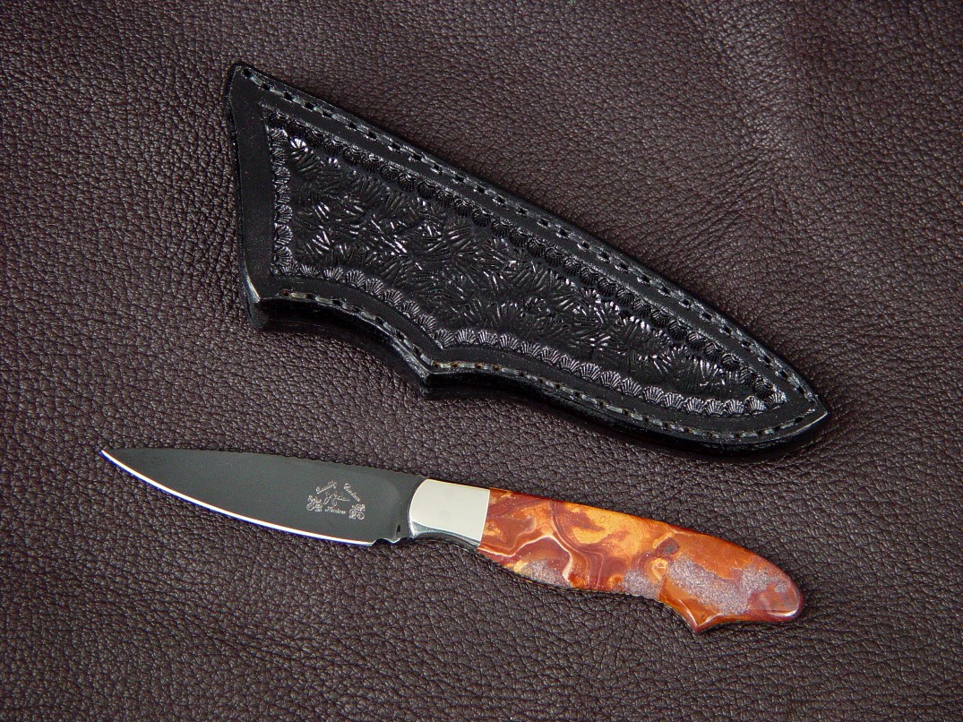 "Nihal" obverse side view in mirror polished and hot blued O1 high carbon tungsten-vanadium tool steel blade, 304 stainless steel bolsters, Wonderstone Jasper gemstone handle, hand-stamped leather sheath