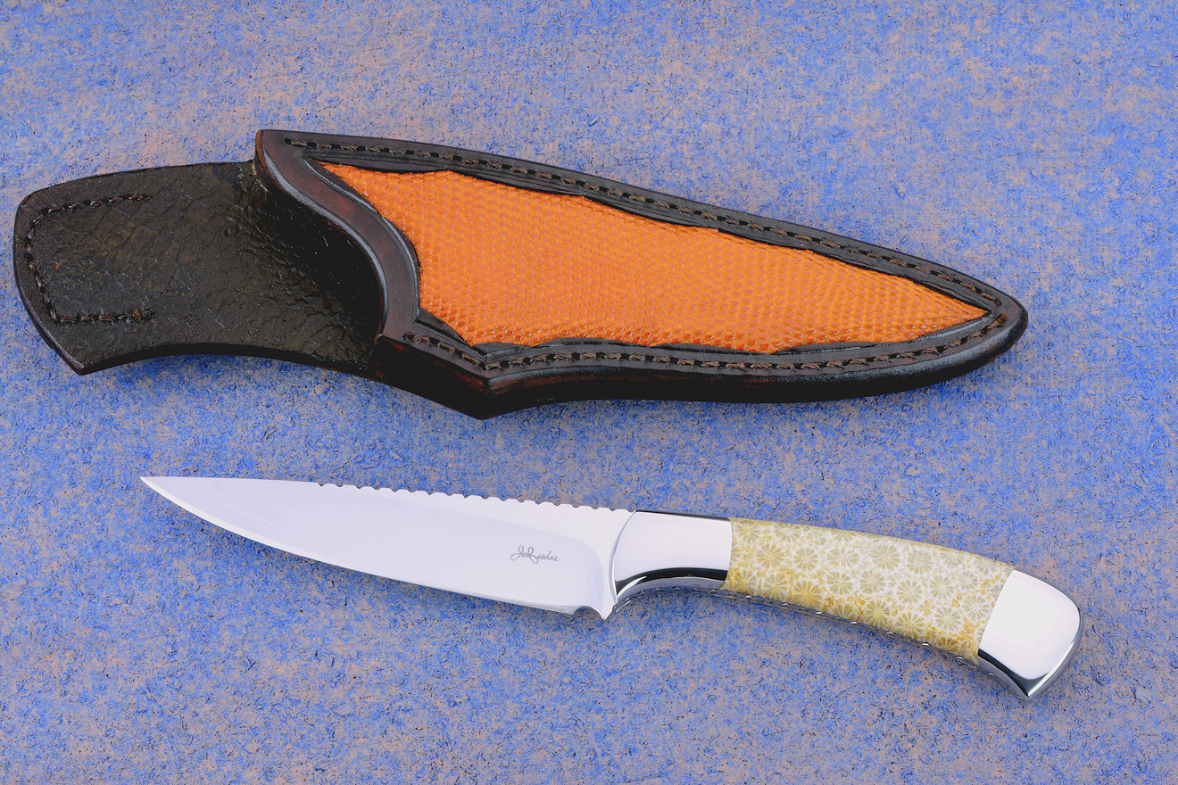 "Phact" obverse side view in 440C high chromium stainless steel blade, 304 stainless steel bolsters, Fossil Coral gemstone handle, hand-carved leather sheath inlaid with lizard skin