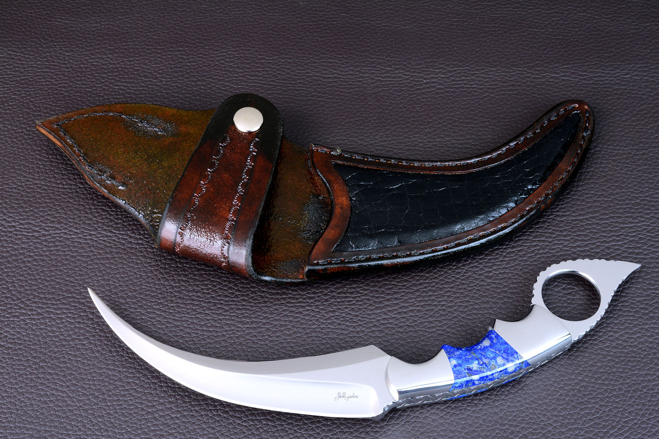 "Raptor" obverse side view in CPM154CM powder metal technology high molybdenum stainless steel blade, 304 stainless steel bolsters, Peruvian Lapis Lazuli gemstone handle, hand-carved leather sheath inlaid with Caiman skin