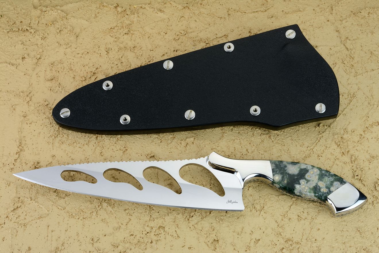 "Sirona" chef's knife, obverse side view in mirror polished 440C high chromium stainless steel blade, 304 stainless steel bolsters, Green Orbicular Agate gemstone handle, slip sheath in kydex and 304 stainless steel fasteners