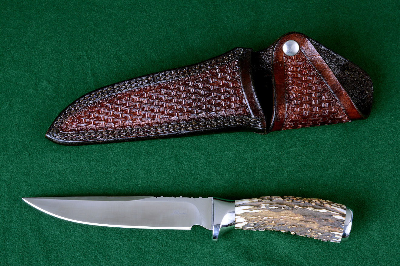 "Yarden" obverse side view in CPMS30V powder metal technology high vanadium tool steel blade, 304 stainless steel guard and pommel, Sambar Stag handle, hand-stamped heavy leather sheath