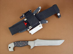 "Arctica" fine survival, combat, tactical, handmade knife, reverse side view. The knife has a complete accessory package mounted to the tough polypropylene belt loop extender