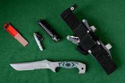 "Arctica" Ultimate Belt Loop Extender accessories, left to right: Diamond pad sharpener, Maglite Solitaire LED, MagTac high intensity LED flashlight, Polypropylene extender mounted on locking sheath with LIMA and HULA flashlight holders.