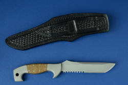 "Arctica" reverse side view with leather sheath. Sheath has double belt loops for several wear positions; all stitching is double row and polyester for strength and moisture resistance.
