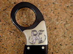 "Argiope" custom monogram rear bolster detail, hand-engraved