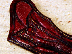 "Argiope" sheath rear belt loop, ostrich leg skin inlay detail. Note the ringed pattern in sheath belt loop top and stitching