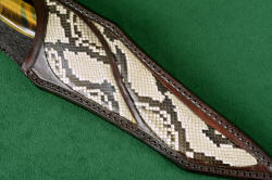 "Argyre" sheath front detail. Python skin is inlaid in leather, bonded, sealed with acrylic, waxed and sealed