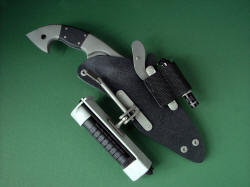 "Aryeh" sheathed view. Sheath accessories can be located in many different position and orientations around sheath. 