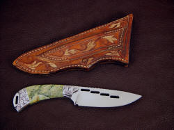 "Bootes" reverse side view. Note full carving and bronze metal wash on sheath back including belt loop
