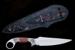"Bulldog" reverse side view. Note extensive sheath carving and inlays in sheath back and belt loop, matching pattern of bolster engraving