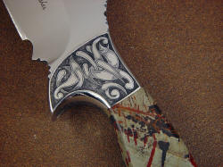 "Bulldog" obverse side front bolster engraving detail. I chose a pattern that matches both the patterns on the sheath and the splashes of color on the gemstone handle.