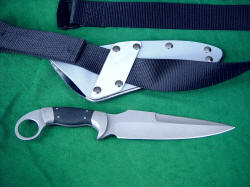 "Bulldog" tactical combat knife, reverse side view. Note tension fit belt straps to rigidly secure knife sheath to utility belt