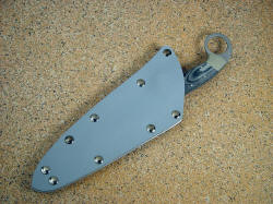 "Bulldog" tactical combat knife, sheathed view. Sheath allows easy and fast extraction of weapon