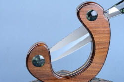 "Concordia" obverse side stand detail. American Black Walnut stand is solid and attractive, with curves that reflect flowing geometry in nebula stone gemstone