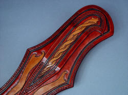 "Duhovni Ratnik" sheath back hand-carving, hand-dying detail in belt loop