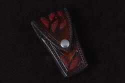 "Elysium" hand-carved leather pouch sheath for folding  knife inlaid with red rayskin