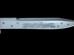 "Freedom's Promise" reverse side blade engraving detail. High chromium stainless steel is difficult do engrave in high detail within the hollow grind.