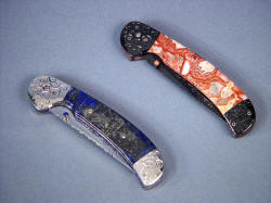 "Gemini" pattern liner lock folding knives, folded view. Note matching thumb openers with small cabochon gemstone inlays of handle material