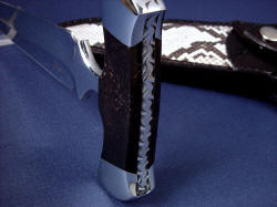 "Grim Reaper" spine view. Handle is bedded, locked under dovetailed 304 stainless steel bolsters. 