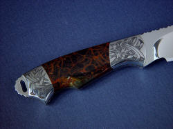 "Grus" reverse side handle detail. engraving of tusks, fangs, or bone needles compliment the spiderweb character of the knife.