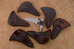 Assortment of Guardian sheaths in brown basketweave leather, both horizontal and vertical, for both left side and right side, front and back wear