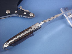 "Hooded Warrior" Tactcial knife, spine, handle detail. Note fully tapered tang, dovetailed stainless steel bolsters