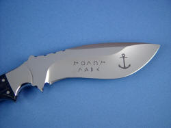 "Hooded Warrior" custom etching on reverse side of blade to client's design