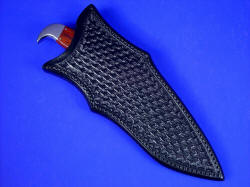 "Hooded Warrior" sheathed view. This is a deep, solid and protective knife sheath that allows easy access to the rear bolster hawk's bill quillon. 