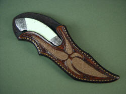 Izanami: sheathed view. Sheath displays handle in marquee window fashion, yet protects blade and point.
