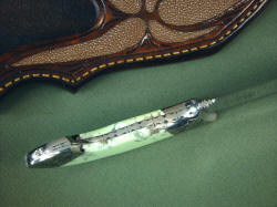 Izanami art, collector's fine knife: inside handle edgework, tang filework detail. Note dovetailed bolsters.
