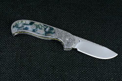 "Izar" linerlock folding knife, reverse side view. Knife has double thumb studs for opening with either hand