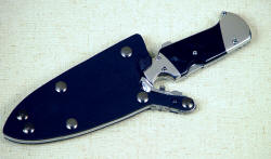"The Kid" sheathed view. The sheath is locking and waterproof.