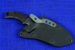 "Krag" tactical, counterterrorism professional knife, sheathed view. Sheath is hybrid tension lock, allowing controlled force or finger pressure for unsheathing