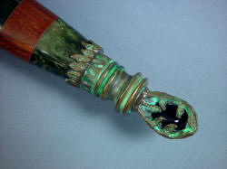 "Lycaon" pommel view with guayabillo hardwood and nephrite jade handle, cast and verdigris bronze fittings, river-polished obsidian pommel inlay