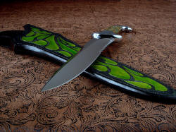 "Macha Navigator EL" point view. Knife has long, large, and substantial blade, beautifully hollow ground and polished, with elegant and functional design