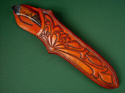 "Magdalena Magnum" sheathed view. Sheath is sunset colored to match the gemstone of the knife. Fit is deep and protective.