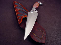 "Malaka" knife blade point detail. Malaka has  a very aggressive point, with full top spine swage and deep hollow grind