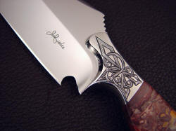 "Malaka" obverse side front bolster detail. Note bolster sculpting, fine lines, hand engraved pattern in high nickel, high chromium stainless steel